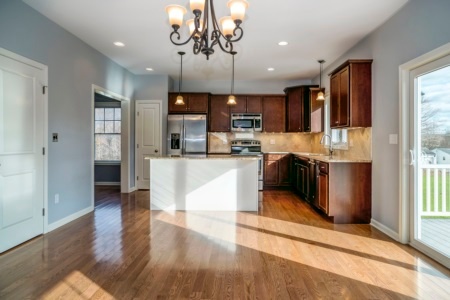 royal-oaks-model-home-den-view-kitchen
