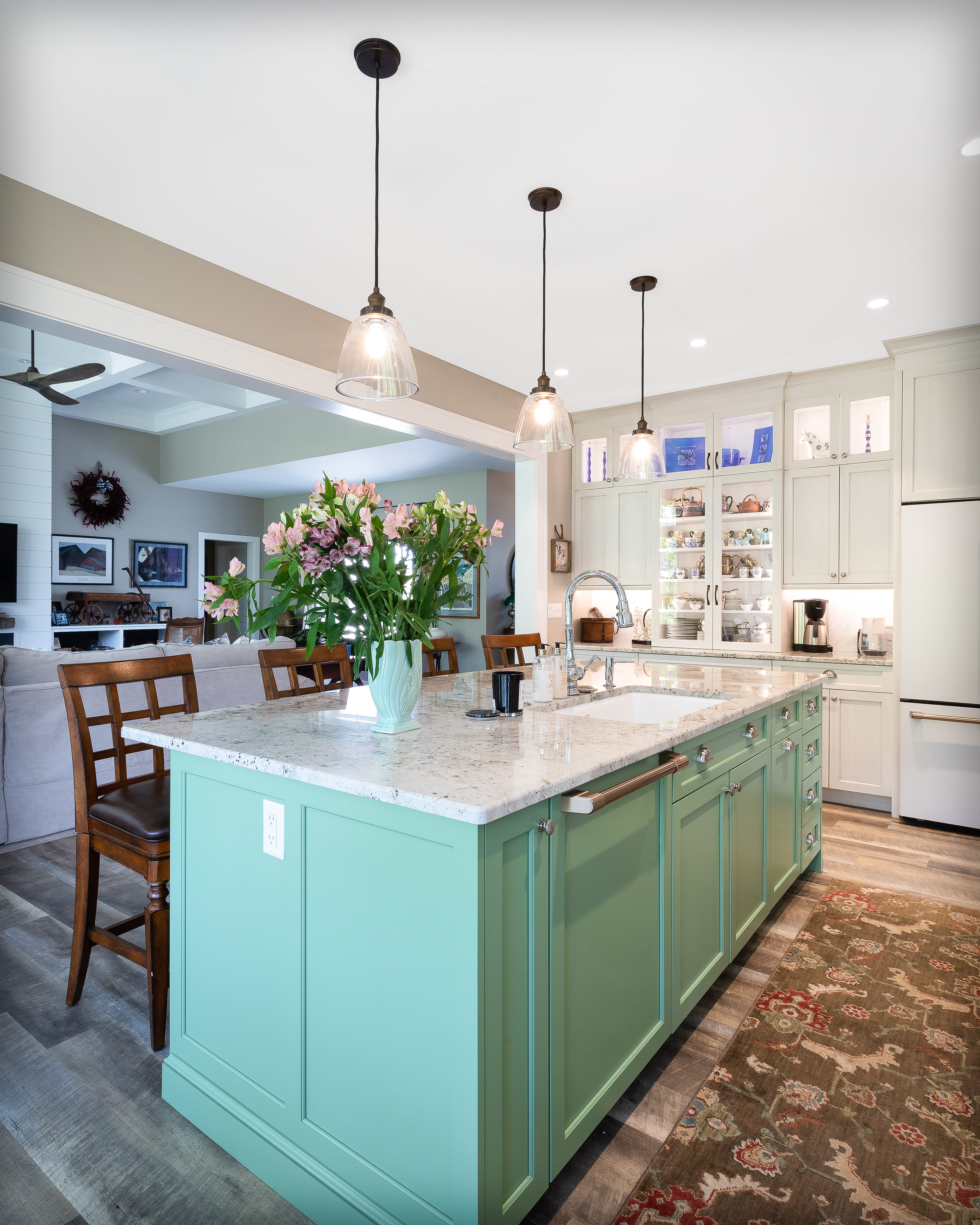 Large Kitchen Island with Beautiful Green Accent Color Cabinetry  | Sunwood Home Builders & Remodelers Large Kitchen Island with Beautiful Green Accent Color Cabinetry  | Sunwood Home Builders & Remodelers